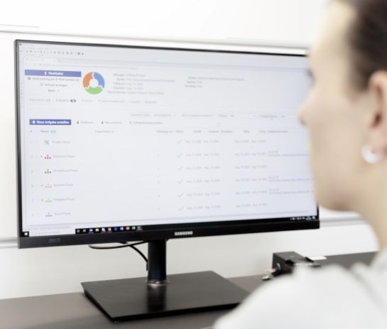 Woman looking at a screen