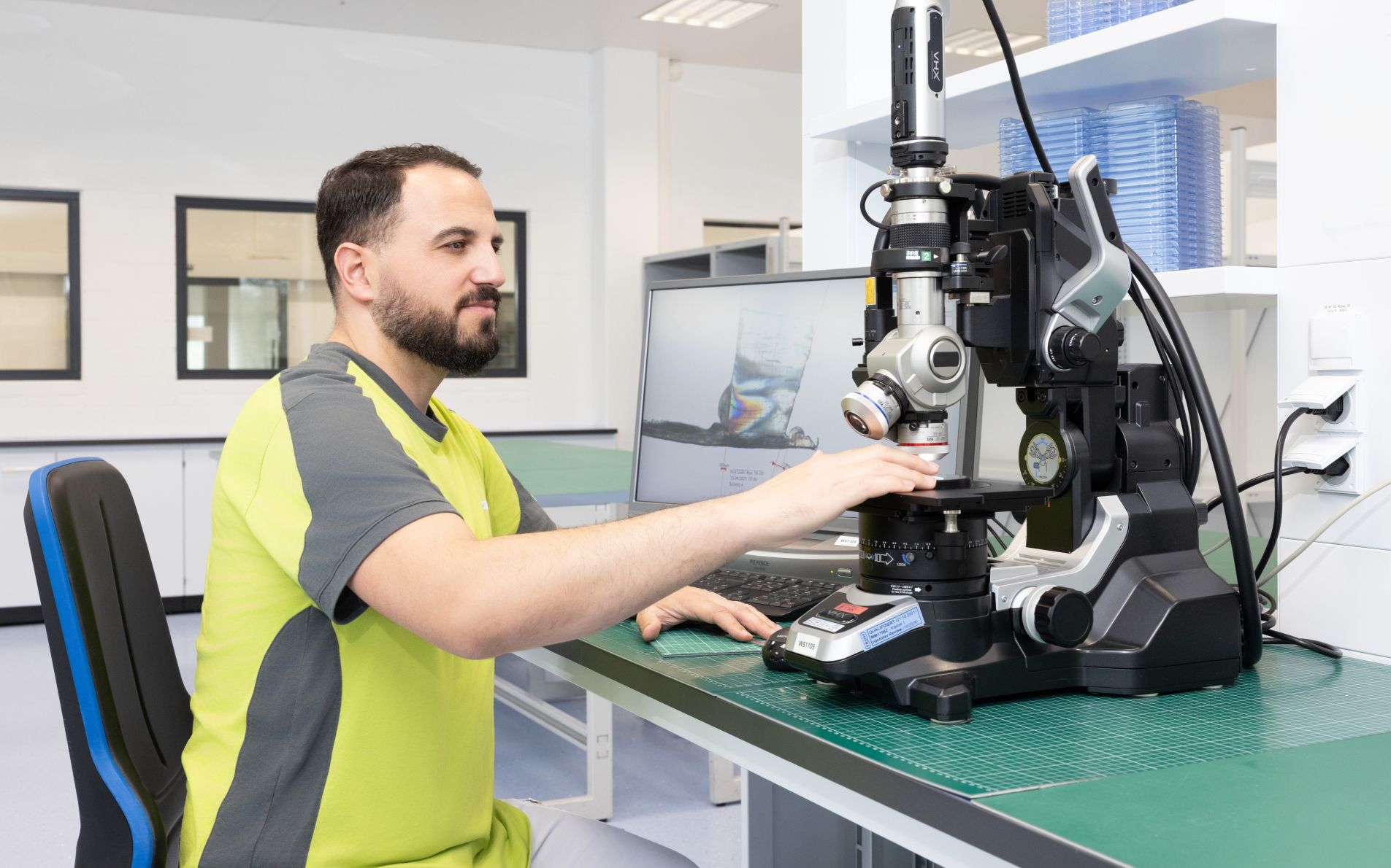 Man serves digital microscope
