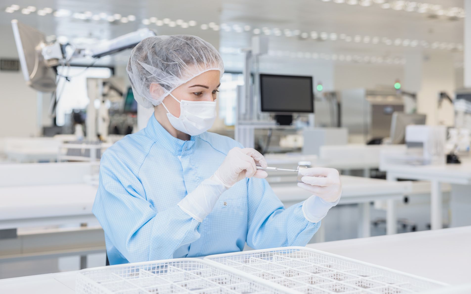 woman assembling implant