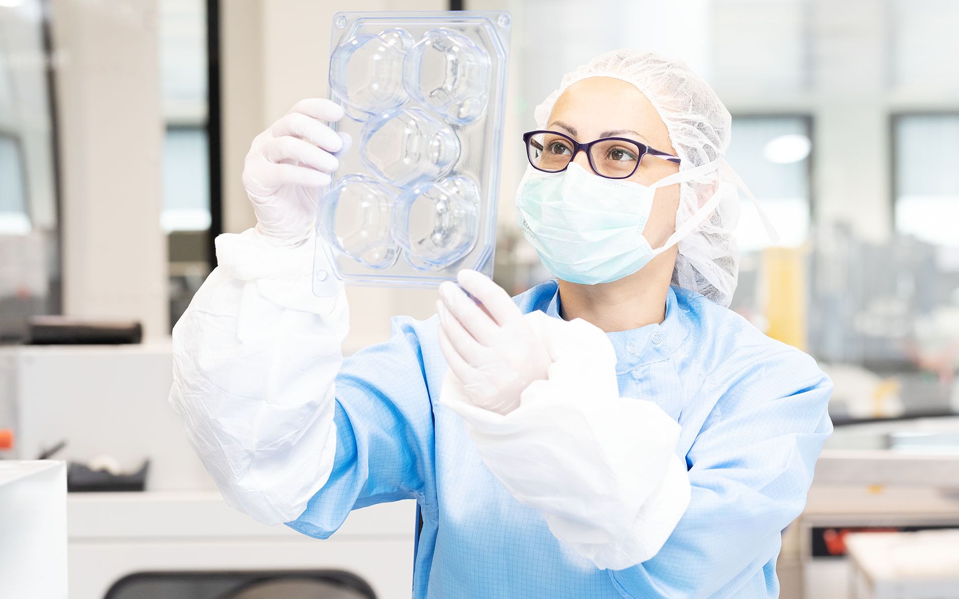 Woman controlling a tray